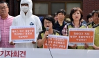 Korean unionists demonstrate against the government's lack of action on the MERS outbreak