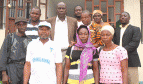 Group of people in Liberia including two widows mentioned in the article