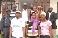 Group of people in Liberia including two widows mentioned in the article