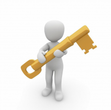 Logo person holding large yellow key