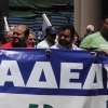 Demonstrators holding an ADEDY banner