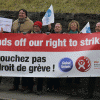 Banner Hands off our right to strike held by demonstrators
