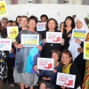 PSI Women's Committee hold banners in solidarity with Korean health workers