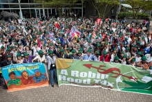One thousand people demonstrating for a robin hood tax