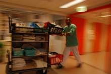 Assisting nurse with trolley