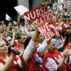 Nurses demonstrating. Banner says "Nurse ratios save lives"